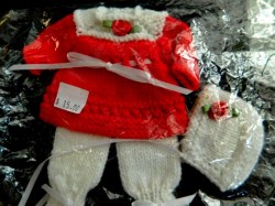 red white small doll a